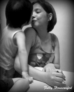 Getting my kisses during our nativity mobile craft time in 2012.